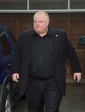 Toronto Mayor Rob Ford leaves his home Thursday May 1, 2014, after announcing his plans to take a leave of absence amid new reports about drug and alcohol use and inappropriate comments. (The Canadian Press/Frank Gunn)