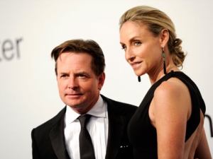 Actors Michael J. Fox and Tracy Pollan attend "Lincoln Center Presents: An Evening With Ralph Lauren" at Alice Tully Hall on Monday, Oct. 24, 2011 in New York. (AP Photo/Evan Agostini)