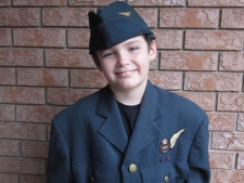 Robert T. Weller's uniform, now worn by his grandson Owen.