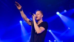 Dan Reynolds of Imagine Dragons performs at The Bud Light Hotel, on Friday, Jan. 31, 2014, in New York. (Photo by Greg Allen/Invision/AP)