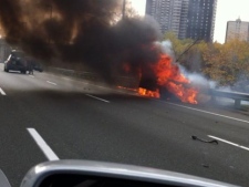 A sport utility vehicle caught fire after a collision in the DVP's southbound lanes near the Bayview-Bloor interchange Thursday, Nov. 10, 2011. (Photo courtesy of Brendan Malette)