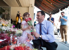 Hudak buys Mother's Day flowers with daughter
