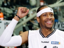 In this Nov. 9, 2010 file photo, former NBA player Allen Iverson gestures to cheering supporters of his new club Besiktas, during a welcome ceremony in Istanbul, Turkey. A judge has dismissed a lawsuit against Iverson over a 2009 bar fight. The Detroit News reports Tuesday, Nov. 15, 2011 that federal Judge Nancy Edmunds found no evidence that Iverson punched an Ohio man or that the man who struck him was linked to the player. (AP Photo/Ibrahim Usta)