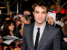 Robert Pattinson arrives at the world premiere of "The Twilight Saga: Breaking Dawn - Part 1" on Monday, Nov. 14, 2011, in Los Angeles. (AP Photo/Chris Pizzello)