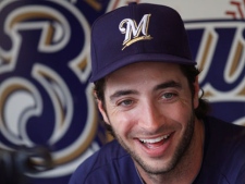 In this June 8, 2011 file photo, Milwaukee Brewers' Ryan Braun reacts in the dugout before their game against the New York Mets, in Milwaukee. Braun won the National League MVP Award in voting announced Tuesday, Nov. 22, 2011. (AP Photo/Jeffrey Phelps, File)