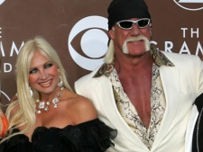 In this Feb. 8, 2006 file photo, Hulk Hogan and his wife Linda arrive at the 48th annual Grammy Awards, in Los Angeles. Court records show a financial settlement has been agreed upon between wrestler Terry Bollea, better known as Hulk Hogan, and his ex-wife Linda. The St. Petersburg Times reports Linda Bollea received a little more than 70 percent of the couple's liquid assets in their divorce settlement. (AP Photo/Chris Carlson, file)
