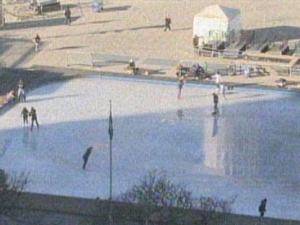 People are seen skating in Nathan Phillips Square Friday afternoon. (CP24)