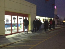 Shoppers wait outside the Toys R Us store at Sherway Gardens to capitalize on Black Friday sales on Friday, Nov. 25, 2011. (CP24/Katie Simpson)