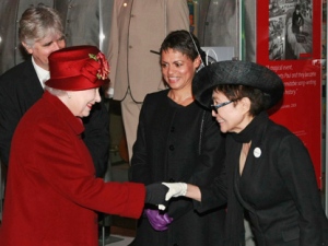 Britain's Queen Elizabeth II, left, meets Yoko Ono, right, during their visit to the Museum of Liverpool in Liverpool, England, Thursday, Dec. 1, 2011. With 8,000 meters of public space, the recently opened museum looks at Britain and the world through the eyes of Liverpool, with 6,000 objects showcasing the city's unique contribution to the world. (AP Photo/Tim Hales-Pool)