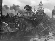 This December 1941 file photo shows heavy damage to ships stationed at Pearl Harbor after the Japanese attack on the Hawaiian island on Dec. 7, 1941. (AP Photo/U.S. Navy)