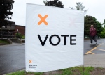 Voters head to the polls on election day in Carleton Place, Ont., on Thursday, June 12, 2014. (The Canadian Press/Sean Kilpatrick)