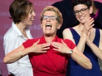 Ontario Premier Kathleen Wynne celebrates on stage with her family after winning the provincial election in Toronto on Thursday June 12, 2014. (Frank Gunn /The Canadian Press)