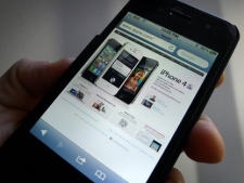 A web page is displayed on an Apple iPhone 4S in Toronto on Thursday, Dec. 8, 2011.(THE CANADIAN PRESS/Graeme Roy)