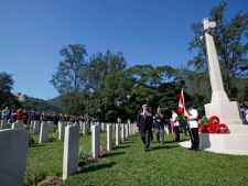 Canadian veterans lay wreath during the Canadian Commemorative Ceremony on the 70th anniversary of the Battle of Hong Kong at Sai Wan War Cemetery in Hong Kong Sunday, Dec. 4, 2011. The ceremony honored the 1,975 Canadian soldiers who fought to defend Hong Kong during the Second World War and remembered over 550 Canadian soldiers who died in the battle. (AP Photo/Kin Cheung)