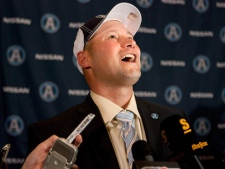 Toronto Argonauts new head coach Scott Milanovich reacts to a question following a press conference to announce his appointment, in Toronto on Thursday, Dec. 1, 2011. (THE CANADIAN PRESS/ Chris Young)