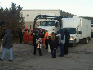 Striking York Region Transit workers block vehicles from exiting a Veolia Environmental yard in Pickering on Tuesday, Dec. 20, 2011. (CP24/Cam Woolley)