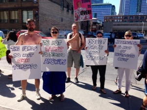 A group of protesters held a demonstration against Mayor Rob Ford ahead of an interview he did at the Newstalk 1010 studio Friday, July 4, 2014. 