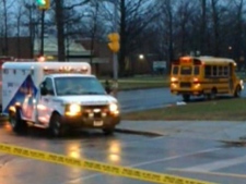 A woman was killed when she was struck by a school bus at Jane Street and Driftwood Avenue on Wednesday, Dec. 21, 2011. (CTV)