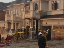 Fire damages homes under construction