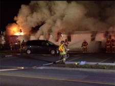 Smoke pours out of a building at Erindale campus as firefighters try to put out the blaze.(Tom Podolec/CP24)