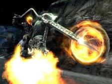In this image provided by publisher 2K, Johnny Blaze pops a wheelie in the video game "Ghost Rider" for the PlayStation 2. (AP Photo/2K)