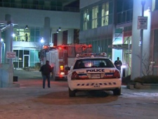A police car is pictured outside a condo building on Town Centre Court in Scarborough after a man plunged from a balcony late Wednesday, Dec. 28, 2011. The SIU is investigating because the man fell while fleeing police.