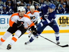 Tampa Bay Lightning defenseman Victor Hedman (77), of Sweden, strips the puck away from Philadelphia Flyers right wing Jaromir Jagr (68), of the Czech Republic, during the first period of an NHL hockey game Tuesday Dec. 27, 2011, in Tampa, Fla. Hedman left the game with an upper body injury. (AP Photo/Chris O'Meara)