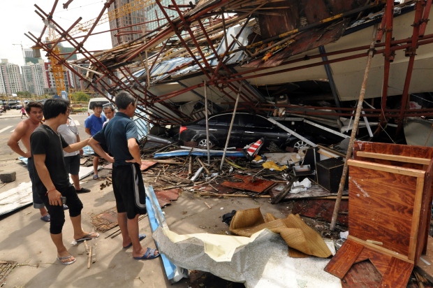 typhoon kills dozens in China, Philippines