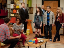 In this undated image released by Nickelodeon, first lady Michelle Obama, seated second left, interacts with Jerry Trainor, left, as Miranda Cosgrove, centre, Nathan Kress and Jennette McCurdy, right, look on during Obama's guest appearance on the popular children's show, "iCarly." (AP Photo/Nickelodeon, Lisa Rose)