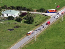 This aerial photo shows the area where a hot air balloon crashed after it caught on fire in Carterton, north of the capital, Wellington, New Zealand, Saturday, Jan. 7, 2012. The hot air balloon crashed and killed all 11 people aboard near the rural New Zealand town some 94 miles (150 kilometers) north of the capital, Wellington, officials said Saturday. (AP Photo/Wairarapa Times, Lynda Feringa)