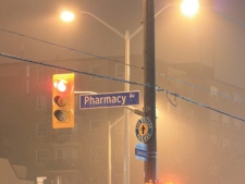 Rain falls under the glow of street lights in Toronto early Thursday, Jan. 12, 2012. (CP24/Tom Stefanac)