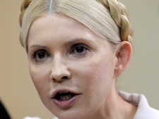 In this Wednesday, July 6, 2011, file photo former Ukrainian prime minister Yulia Tymoshenko speaks during a trial hearing at the Pecherskiy District Court in Kiev, Ukraine. (AP Photo/Sergei Chuzavkov, File)