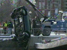 A vehicle being removed from Lake Ontario Saturday afternoon is shown. (CP24)