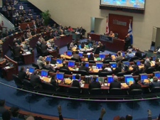 Toronto city councillors attend a meeting at city hall in this Wednesday, Jan. 18, 2012, photo.