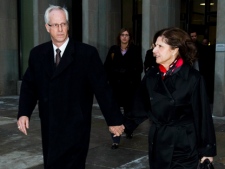 Former Nortel Networks CEO Frank Dunn and his wife Nancy leave court in Toronto on Monday, Jan. 16, 2012. (THE CANADIAN PRESS/Frank Gunn)