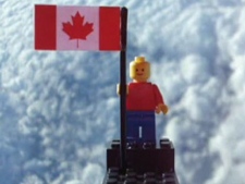 Two 17-year-old Agincourt Collegiate Institute students successfully launched a balloon carrying a Lego man and a small Canadian flag out of earth's atmosphere.
