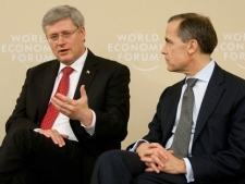 Bank of Canada Governor Mark Carney looks on as Canadian Prime Minister Stephen Harper opens a meeting with international business leaders at the World Economic Forum in Davos, Thursday January 26, 2012. THE CANADIAN PRESS/Adrian Wyld