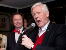 Liberal Leader Bob Rae speaks to supporters as Senator Dennis Dawson, left, looks on during a province wide tour Tuesday, January 24, 2012 in Quebec City. THE CANADIAN PRESS/Jacques Boissinot