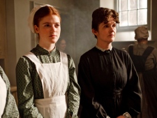 In this publicity image released by PBS, Rose Leslie, left, and Siobhan Finneran are shown in a scene from "Downton Abbey." (AP Photo/PBS)