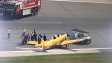 Landing gear collapses on airshow plane