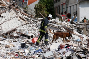 Building collapse near Paris kills two