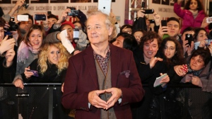 Bill Murray poses for photographers on a red carpet in Pioltello, Italy, on Feb. 10, 2014. Murray plays a curmudgeonly retiree who forges an unlikely friendship with a 12-year-old neighbour, in a film presented at the Toronto International Film Festival that kicks off Thursday THE CANADIAN PRESS/ Antonio Calanni