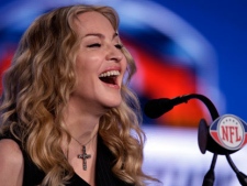 Madonna speaks during a news conference for NFL footbal's Super Bowl XLVI's halftime show on Thursday, Feb. 2, 2012, in Indianapolis. (AP Photo/Matt Slocum)