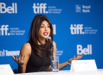 Actress Priyanka Chopra speaks during the press conference for the film "Mary Kom" at the 2014 Toronto International Film Festival in Toronto on Thursday, Sept. 4, 2014. (AP Photo/The Canadian Press, Hannah Yoon)