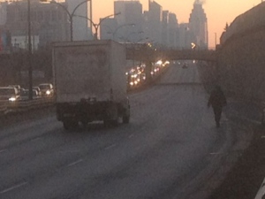 Toronto police closed the Gardiner Expressway's eastbound lanes at Jameson Avenue after a woman was struck by a truck early Monday, Feb. 6, 2012. (CP24/Cam Woolley)