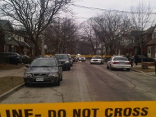 Toronto police investigate after a man was fatally shot in an altercation with police officers on Milverton Boulevard on Friday, Feb. 3, 2012. (CTV News/Austin Delaney)
