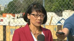 Mayoral candidate Olivia Chow speaks with reporters at a residential construction site at the corner of Eglinton Avenue West and Widdicombe Hill Boulevard. Chow is accusing John Tory of failing to do “his homework” on his SmartTrack transit proposal. 