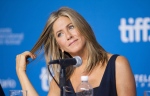 Actor Jennifer Aniston listens during a press conference for "Cake" at the 2014 Toronto International Film Festival in Toronto on Tuesday, Sept. 9, 2014. (AP Photo/The Canadian Press, Hannah Yoon)