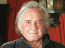 In a 1999 file photo, the late country music legend Johnny Cash is shown at his Hendersonville, Tenn., home. (AP Photo/Mark Humphrey, file)