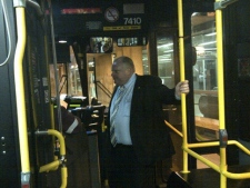 Mayor Rob Ford rides a TTC bus in this photo posted to Twitter early Thursday, Feb. 9, 2012. (Twitter/Isaac Ransom)